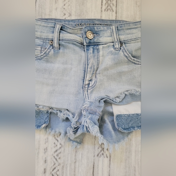 American Eagle Outfitters distressed blue denim shorts Size 10 - Picture 15 of 16
